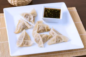 Пельмені з гребінцем та куркою (6шт)